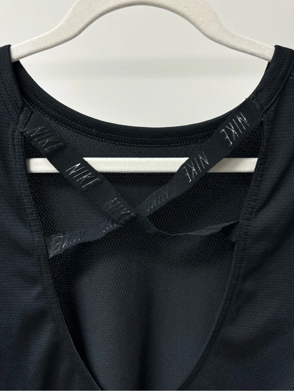 Nike Dri-Fit Long Sleeve Scoop Back Criss-Cross Top‎ in Black, Size S